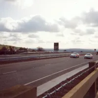 Police lead the first cars on the newly-opened A30 at Sourton Cross