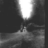 The Ruse Family walking up the drive way to Brimpts Farmhouse