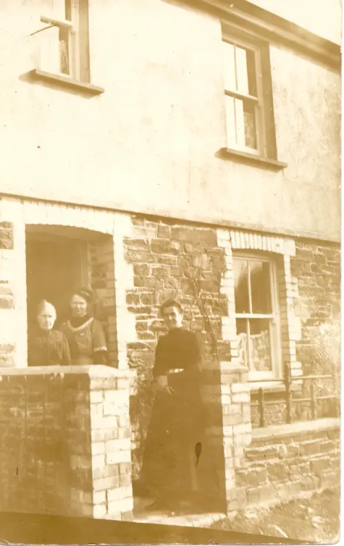 Ladies outside a cottage at Shellaford