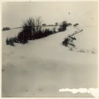 Dartmoor lane all but buried by the snow