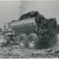 Large truck removing waste materials