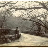 Holne Bridge with unknown lady sitting on parapetUncatalogued