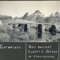 Postbridge - very ancient clapper bridge in foreground.