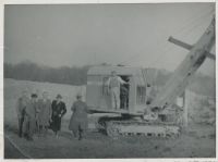 Owners of WBB pose for photo with new digger