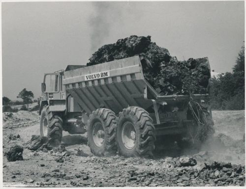 Large truck removing waste materials