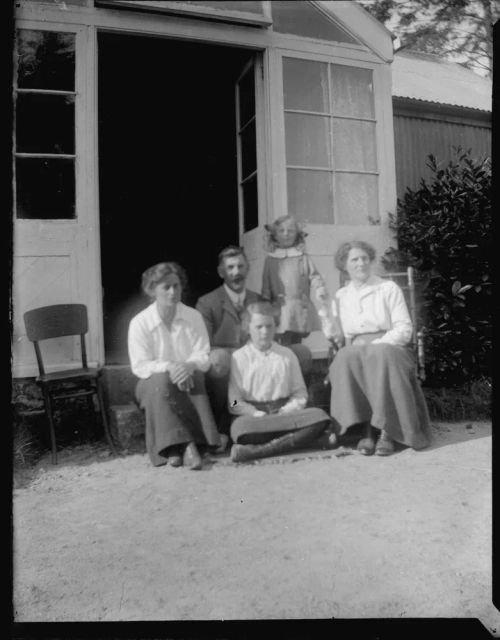 The Horton and Ruse families on the steps of the "music room" at Brimpts Farmhouse